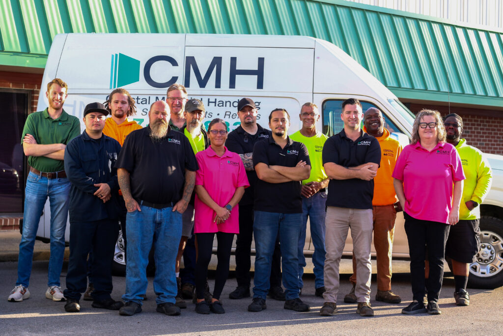 CMH team in front of a van