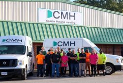 CMH team in front of the building