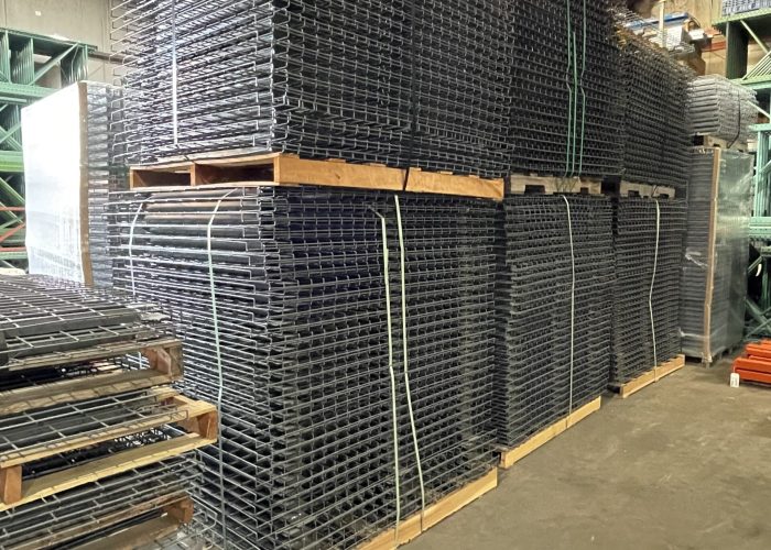 new wire decks stacked in warehouse